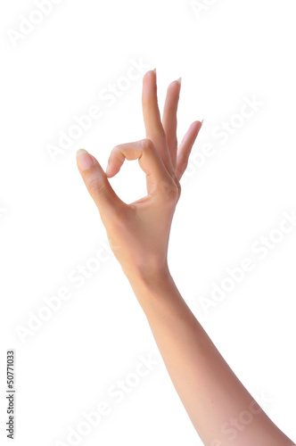 Ok. Gesture of the woman hand on white background photo