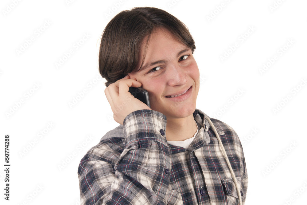 Teenage boy talking on mobile phone Teenage boy talking on mobile phone