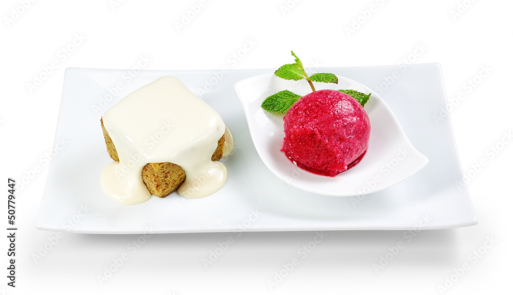 Tasty dessert with ice cream on a plate on a white background. Tasty dessert with ice cream on a plate on a white background.
