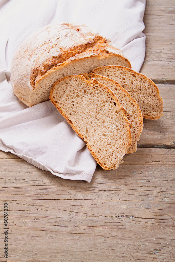 Fresh bread on a wooden table