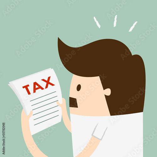 young man reading a document with an aghast expression
