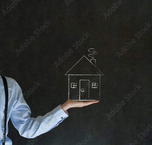 Man with chalk home house or real estate