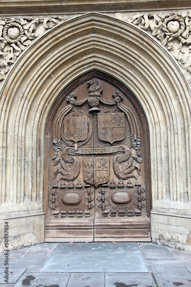 Brown wood old door in the cathedral in Bath, England