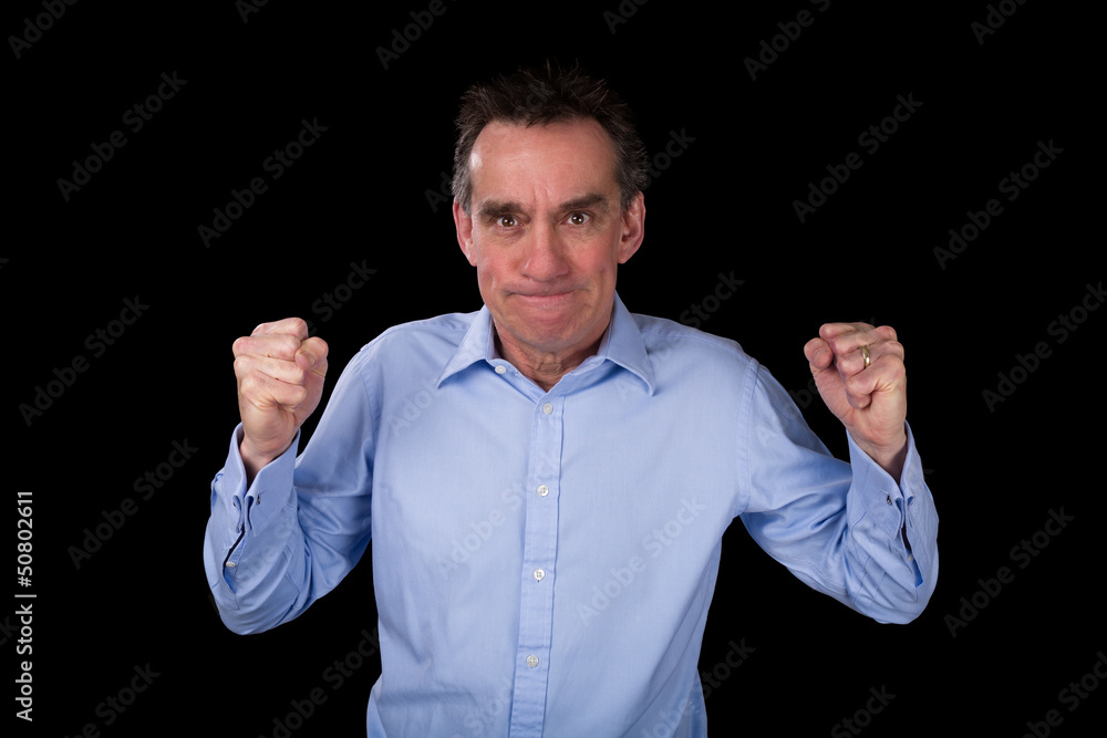 Angry Business Man Shaking Fists in Frustration Angry Business Man Shaking Fists in Frustration