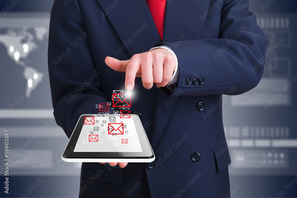 businessman using wireless technology with a computer device businessman using wireless technology with a computer device