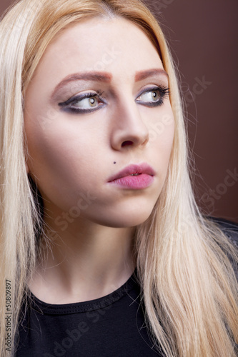 Close up portrait of a beautiful rock girl