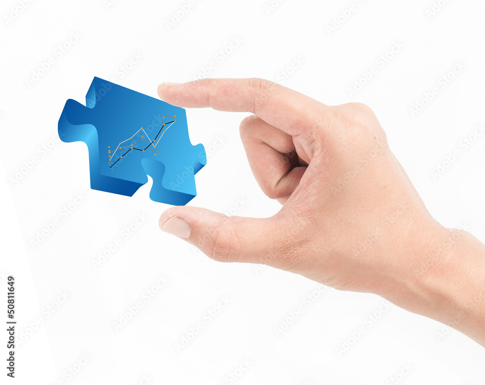 Hand with puzzle isolated on white background Hand with puzzle isolated on white background