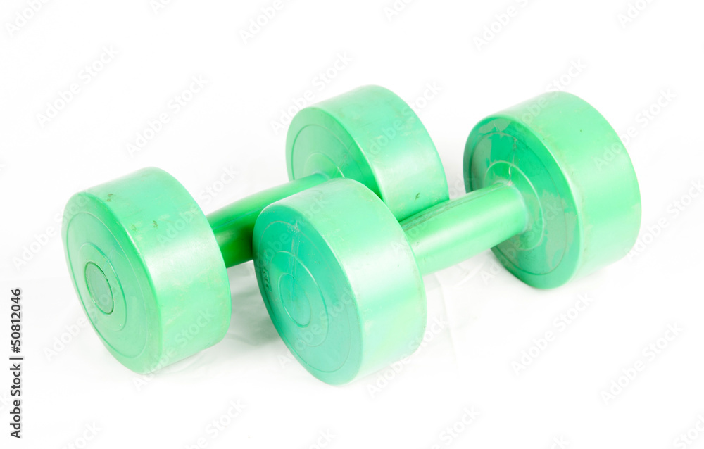 green dumbbell isolated on a white background green dumbbell isolated on a white background