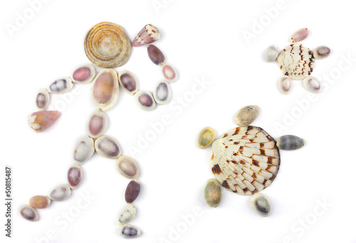 seashells in the shape of human with two turtles