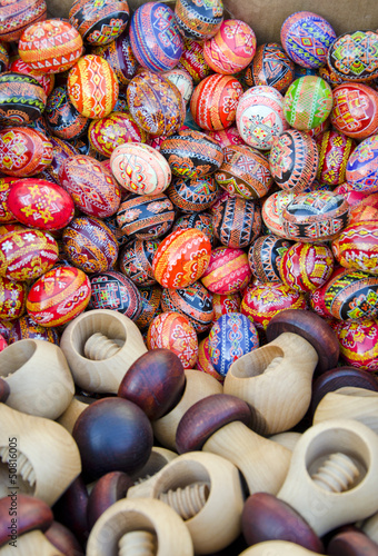 colorful easter eggs and wooden nutcrackers in fair