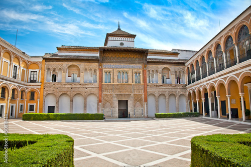 Courtyard with fontain of Alcazar, Seville, Spain