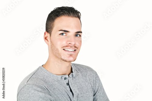 Portrait of a sportive young man isolated on white