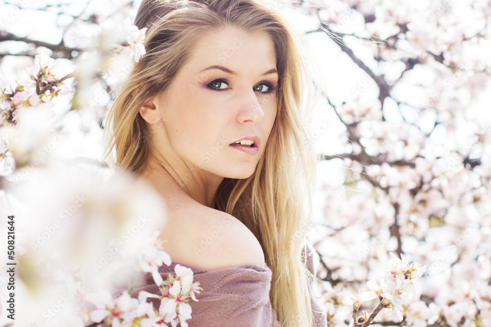 beautiful blonde girl in spring cherry garden beautiful blonde girl in spring cherry garden