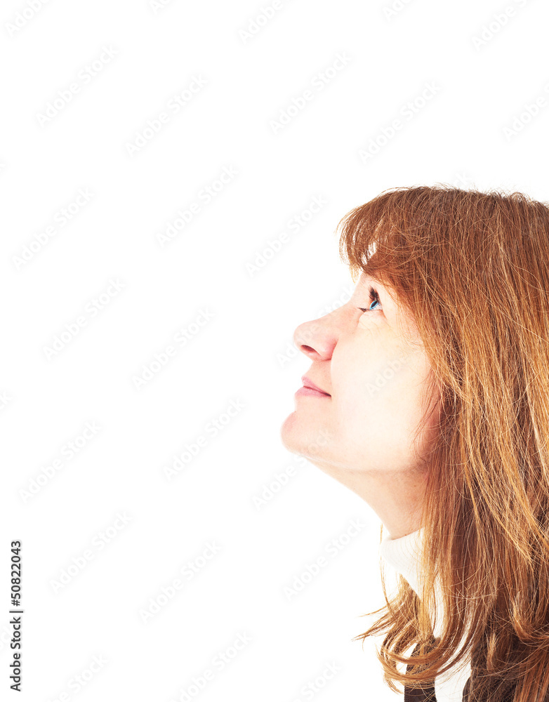 Beautiful woman in profile looking up Beautiful woman in profile looking up