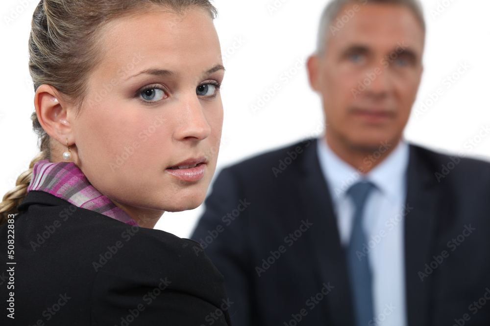 Boss having one-to-one with female employee Boss having one-to-one with female employee