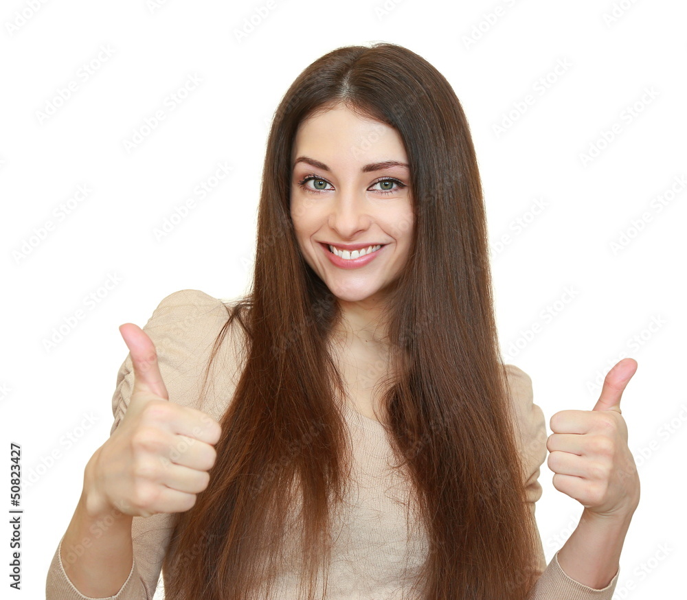 Smiling happy woman with two thumbs up and looking isolated on w Smiling happy woman with two thumbs up and looking isolated on w