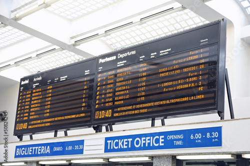 Board schedules of arrivals and departures of trains in an Itali