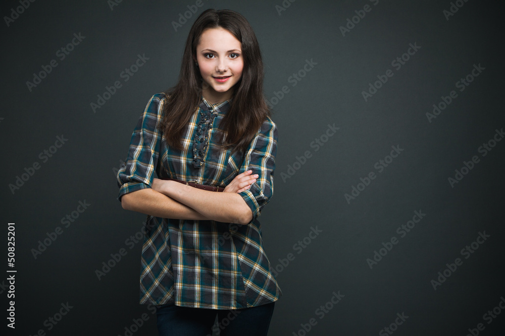 Lovely smiling girl on dark background Lovely smiling girl on dark background