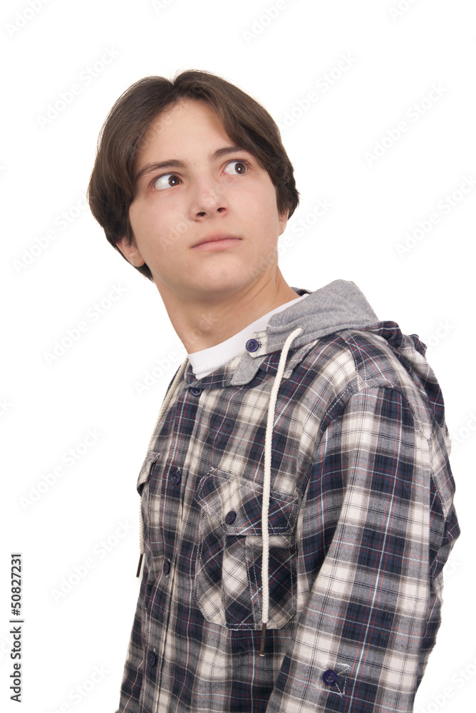 Handsome teenager looking back amazed Handsome teenager looking back amazed