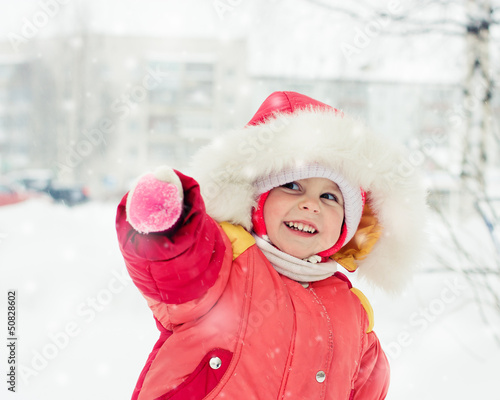 The kid in red jacket winter.