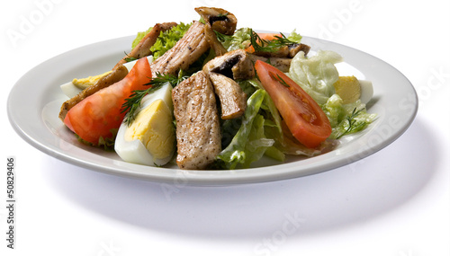 meat salad served on white plate