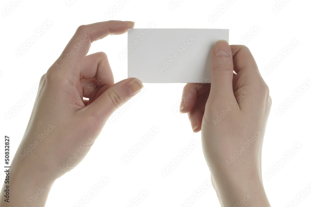 Hand holding blank paper label Hand holding blank paper label
