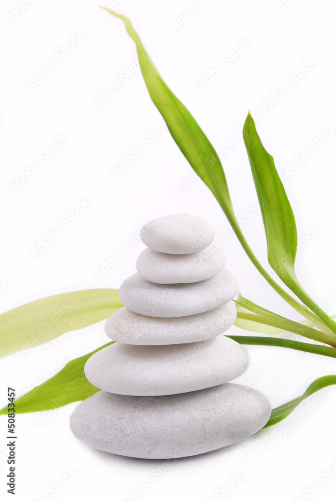 Obraz premium Zen stones isolated on white background with bamboo