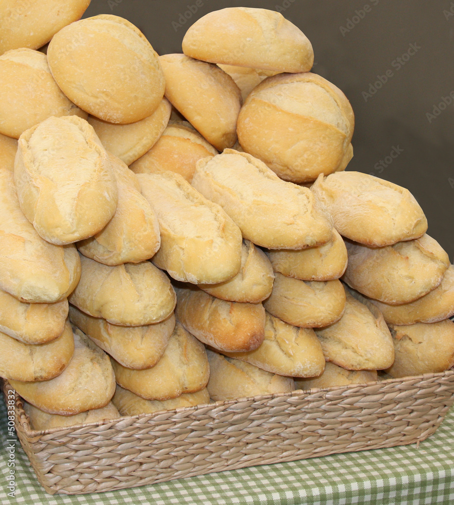 A Stack of Freshly Baked Crusty Bread Loaves. A Stack of Freshly Baked Crusty Bread Loaves.