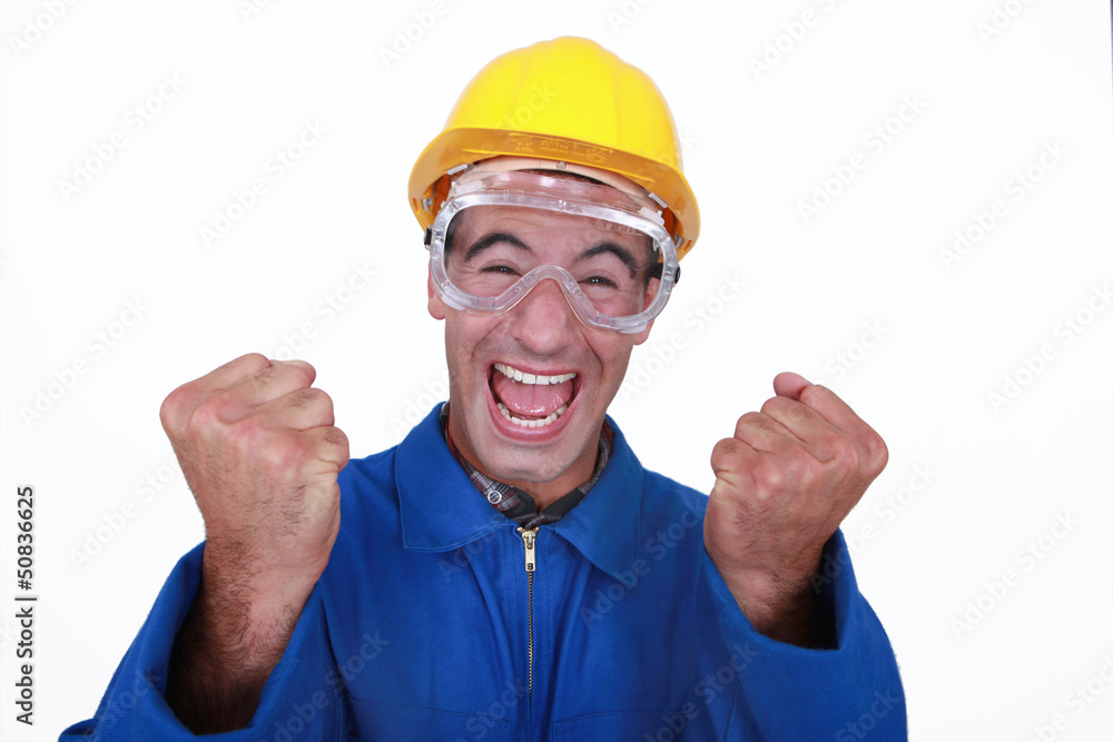 An ecstatic construction worker. An ecstatic construction worker.