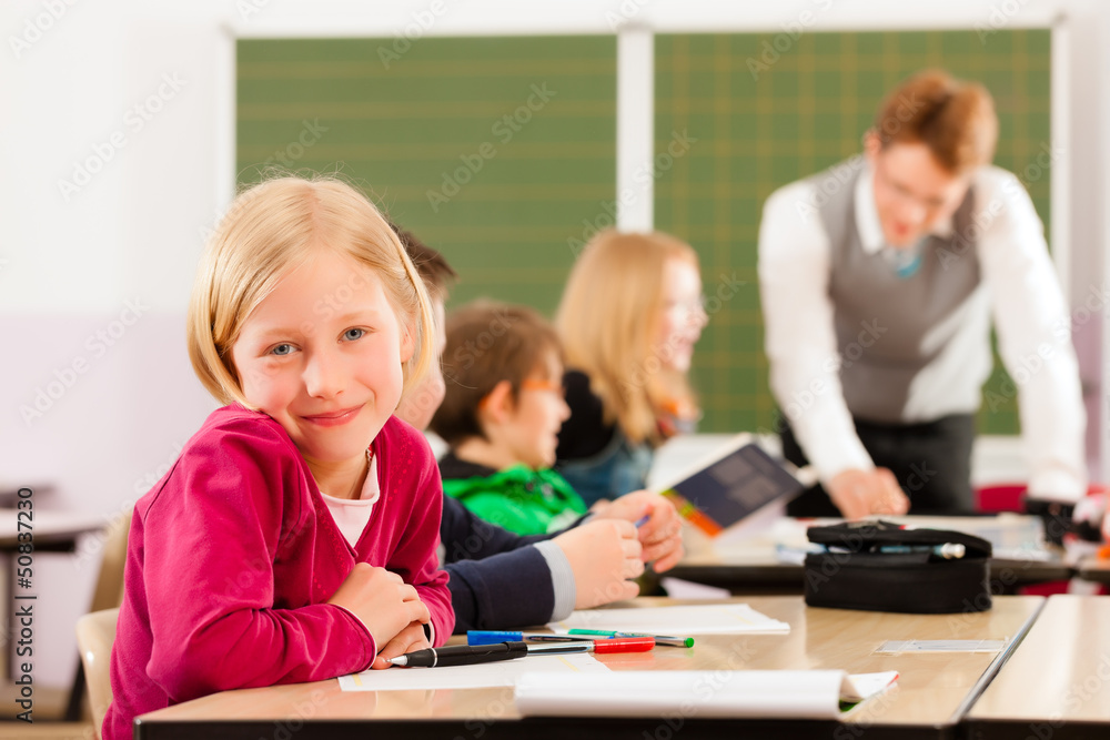 Education - Pupils and teacher learning at school Education - Pupils and teacher learning at school