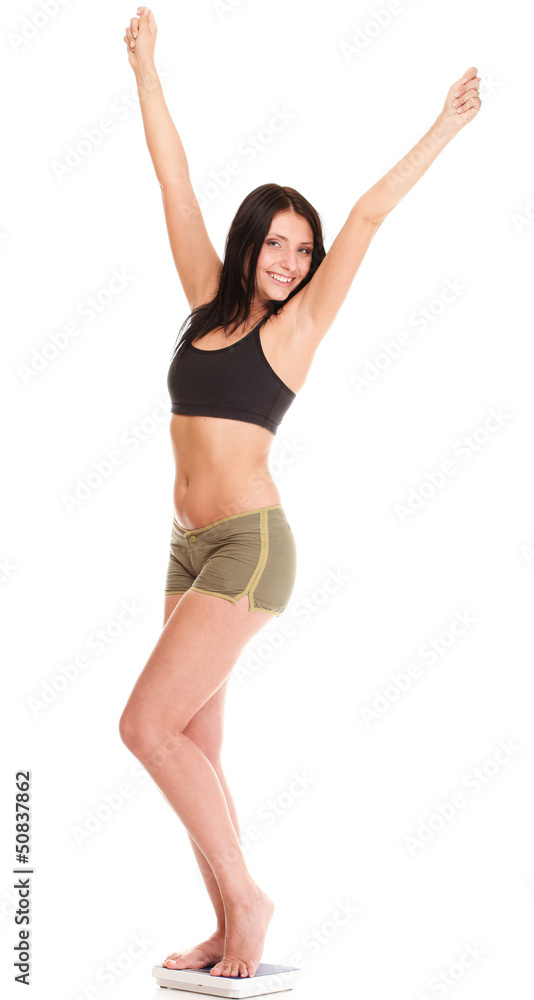 Weight loss woman on scale happy Weight loss woman on scale happy