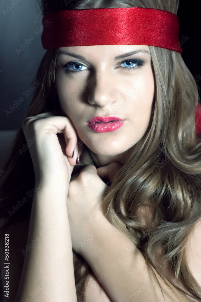 Blond woman with a red headband Blond woman with a red headband