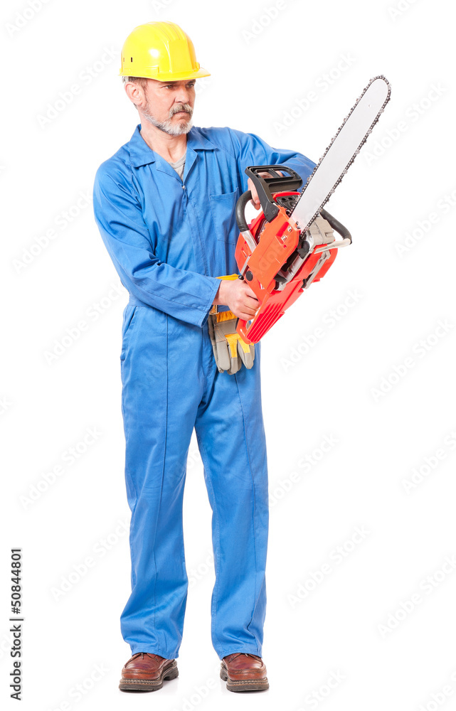 Worker with a chainsaw