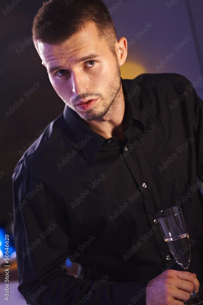 Young man with champagne flute Young man with champagne flute