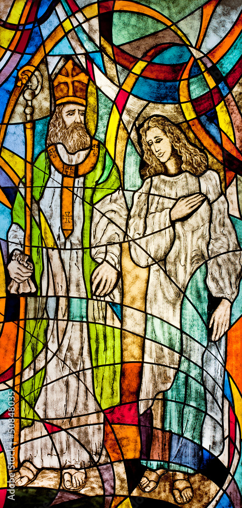 Stained glass showing Bishop Nicholas and believer