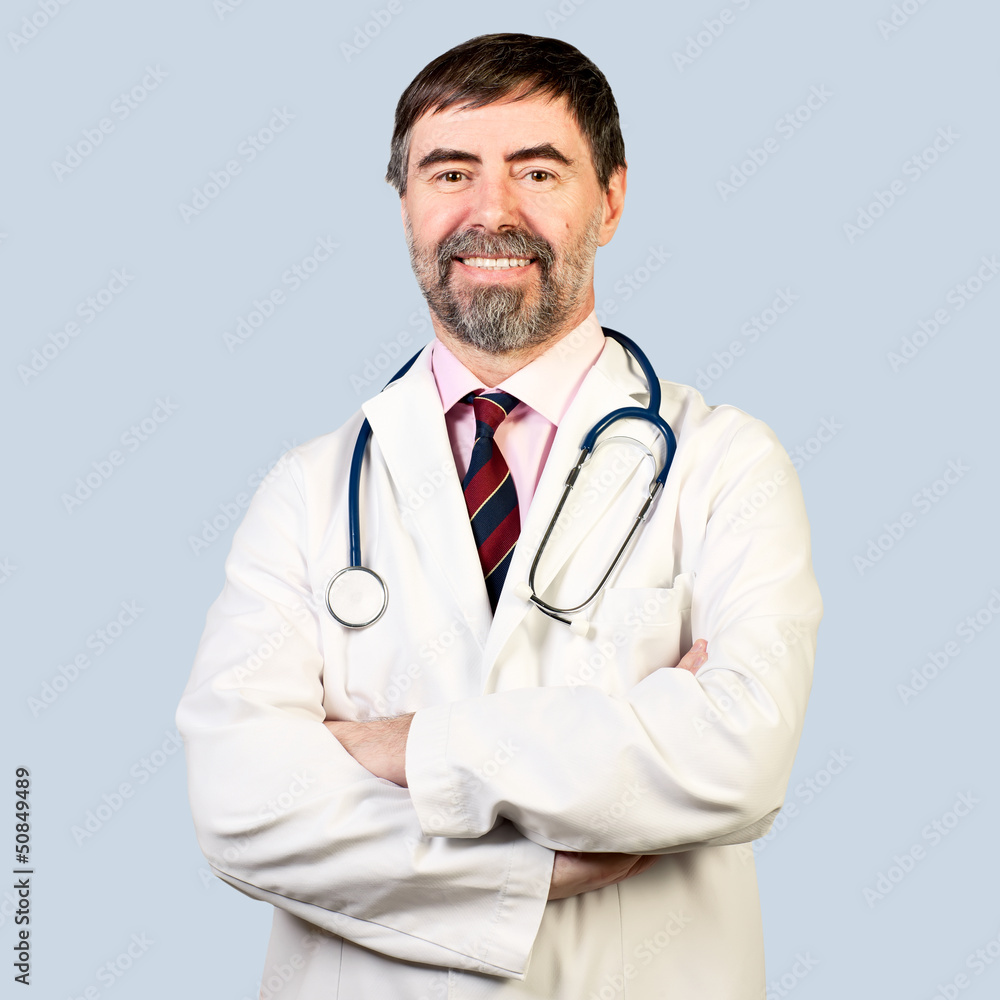 Fototapeta premium happy middle-aged doctor with stethoscope