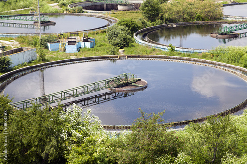 Cleaning construction for a sewage treatment photo