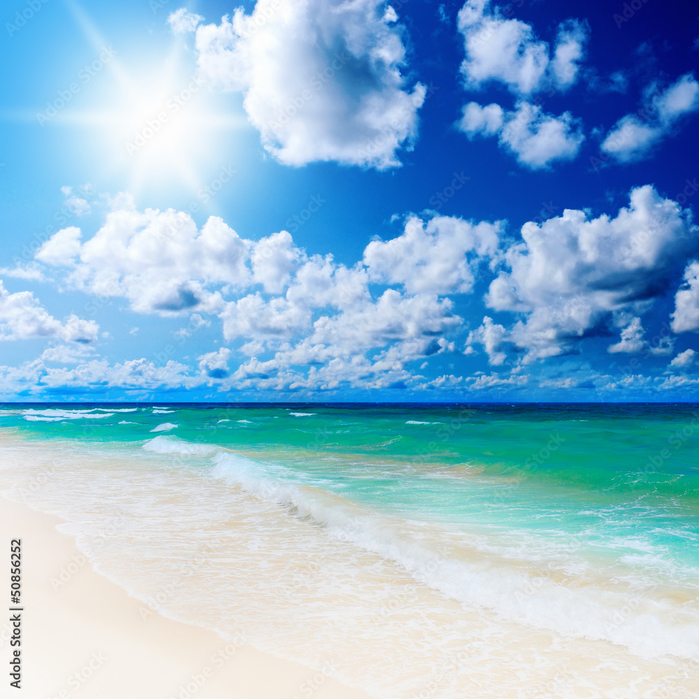 Sunny tropical beach on the island Sunny tropical beach on the island