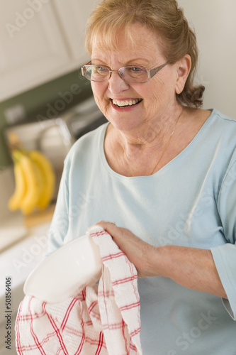 Senior Adult Woman Drying B...