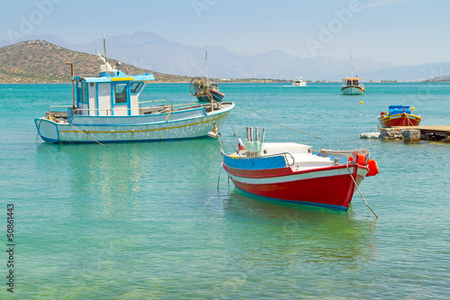White Greek boats at the coast of Crete © Patryk Kosmider
