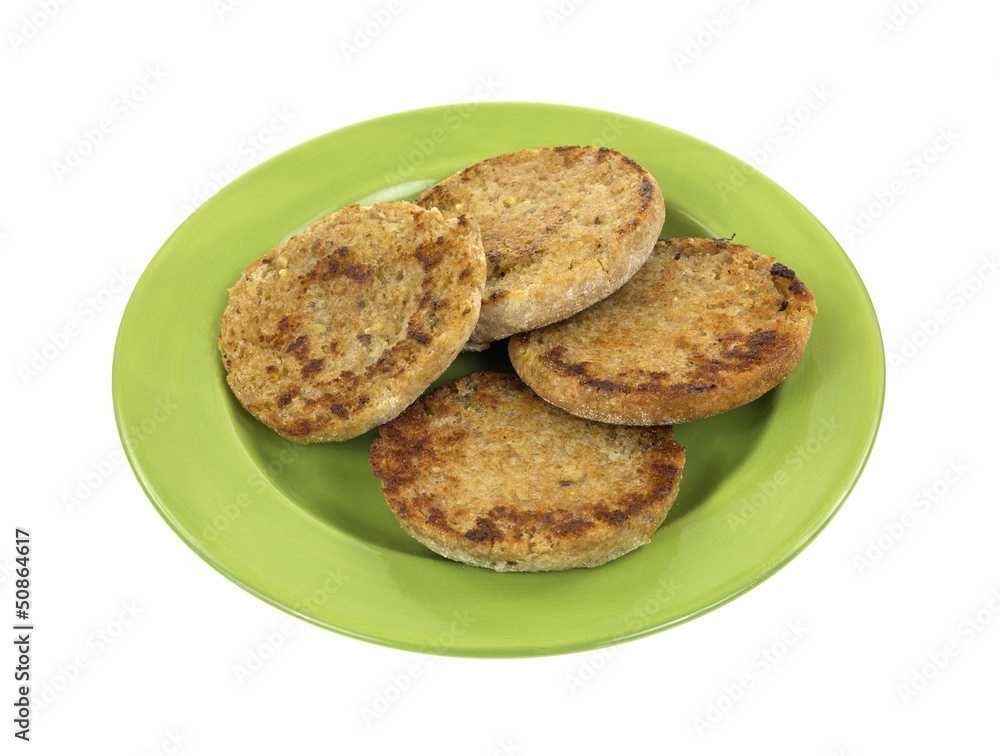 Whole wheat English muffins on plate