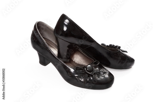 Black lacquered high-heeled shoes for girls