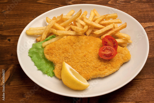 Cotoletta e patatine fritte