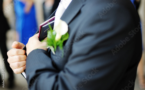 groom with passports