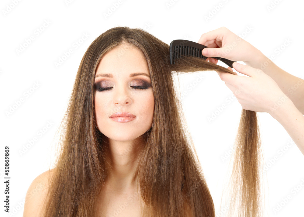 Obraz premium Woman with long hair in beauty salon, isolated on white