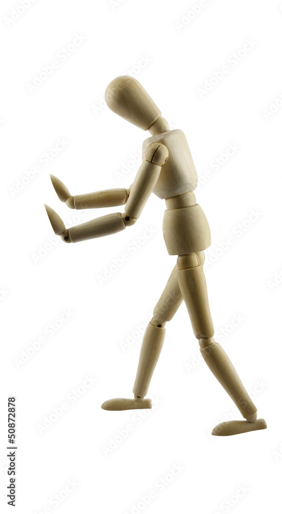 Wooden figure walking concept push with clipping path Wooden figure walking concept push with clipping path