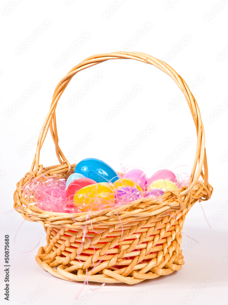 Easter basket with colorful eggs Easter basket with colorful eggs