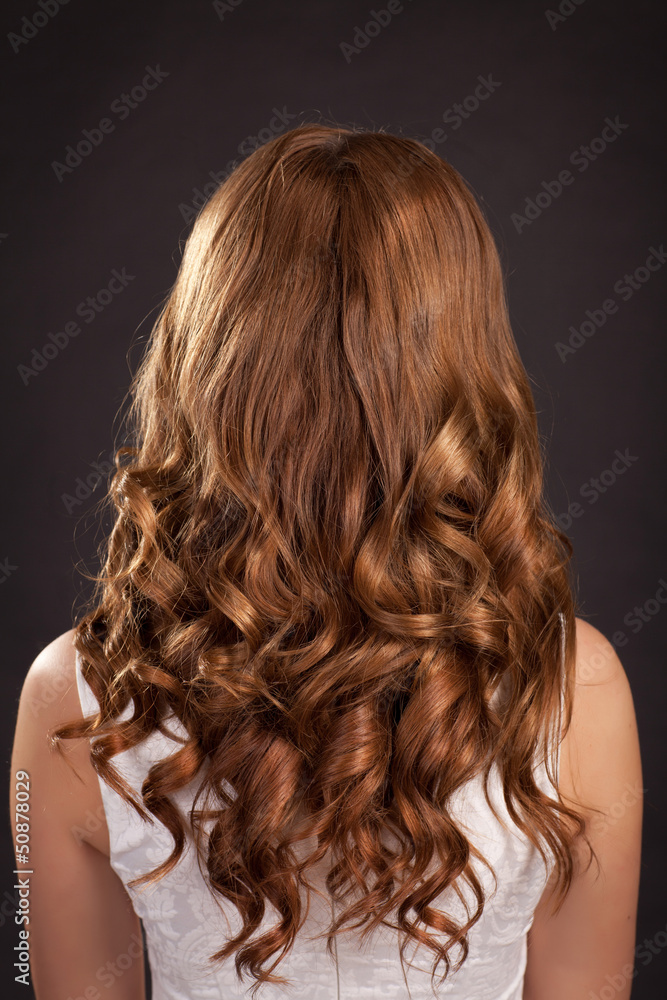 Beautiful long hair Brunette woman with curly hairstyle Beautiful long hair Brunette woman with curly hairstyle