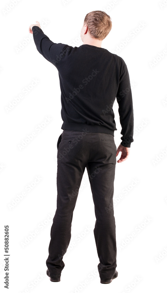 Back view of pointing young business men in black sweater Back view of pointing young business men in black sweater