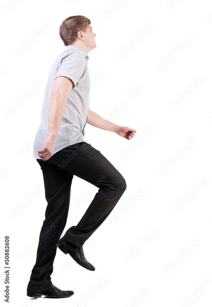 back view of running business man . back view of running business man .
